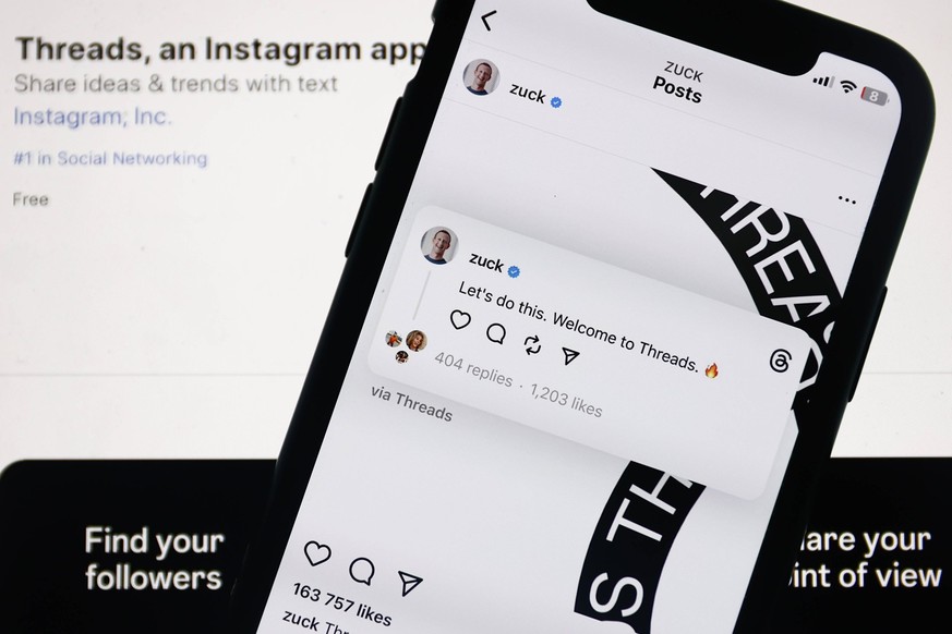 Threads And Mark Zuckerberg Instagram Photo Illustrations Threads on App Store displayed on a laptop screen and Mark Zuckerberg Instagram post about Threads are seen in this illustration photo taken i ...