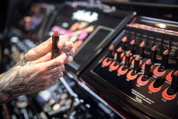 OBERHAUSEN, GERMANY - MARCH 28: A woman tests Sephora cosmetic products during the Sephora store opening at Galeria Kaufhof on March 28, 2018 in Oberhausen, Germany. (Photo by Thomas Lohnes/Getty Imag ...