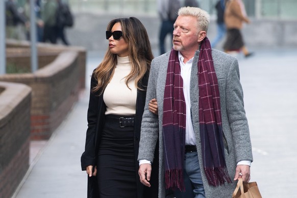 German former tennis player Boris Becker and girlfriend Lilian de Carvalho are seen returning to court where the German is facing a bankruptcy trial and has been charged with 24 counts relating to con ...