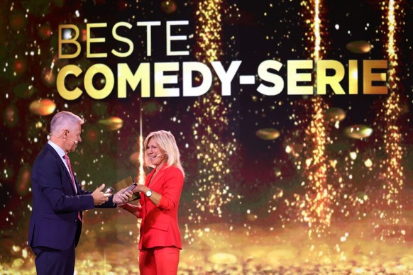 COLOGNE, GERMANY - SEPTEMBER 16: Peter Kloeppel and Ulrike von der Groeben present the &quot;Best Comedy-Serie&quot; on stage during the German Television Award (Der Deutsche Fernsehpreis 2021) at Tan ...