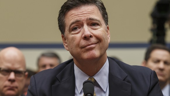 FILE - In this file July 7, 2016, photo then-FBI Director James Comey testifies before the House Oversight Committee to discuss Hillary Clinton&#039;s email investigation, at the Capitol in Washington ...