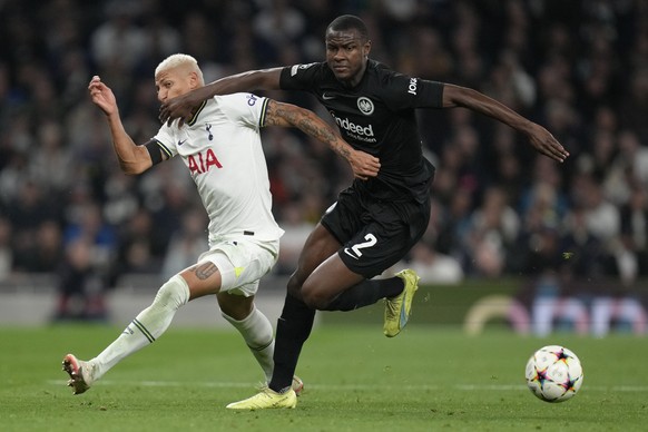 Tottenham's Richarlison, left, and Frankfurt's Evan N'Dicka vie for the ball during the Champions League Group D soccer match between Tottenham Hotspur and Eintracht Frankfurt at Tottenham Hotspur sta ...