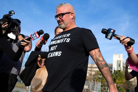 Syndication: USA TODAY Proud Boys organizer Joseph Biggs walks from the George C. Young Federal Annex Courthouse in Orlando, Fla., on Jan. 20, 2021, after a court hearing regarding his involvement in  ...