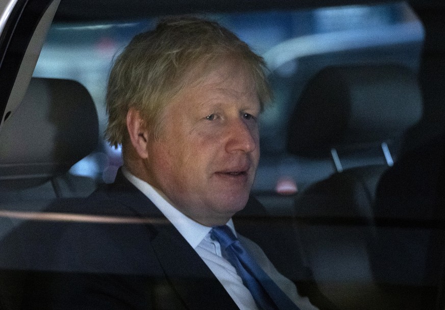 British Prime Minister Boris Johnson leaves his hotel, Tuesday, Sept. 24, 2019, in New York. (AP Photo/Mark Lennihan)