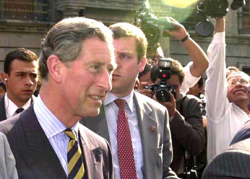 402033 03: Britain&#039;s Prince Charles walks in Mexico City surrounded by the media and bodyguards after a meeting March 7, 2002 in Mexico City, Mexico. Prince Charles is on his second day of a thre ...