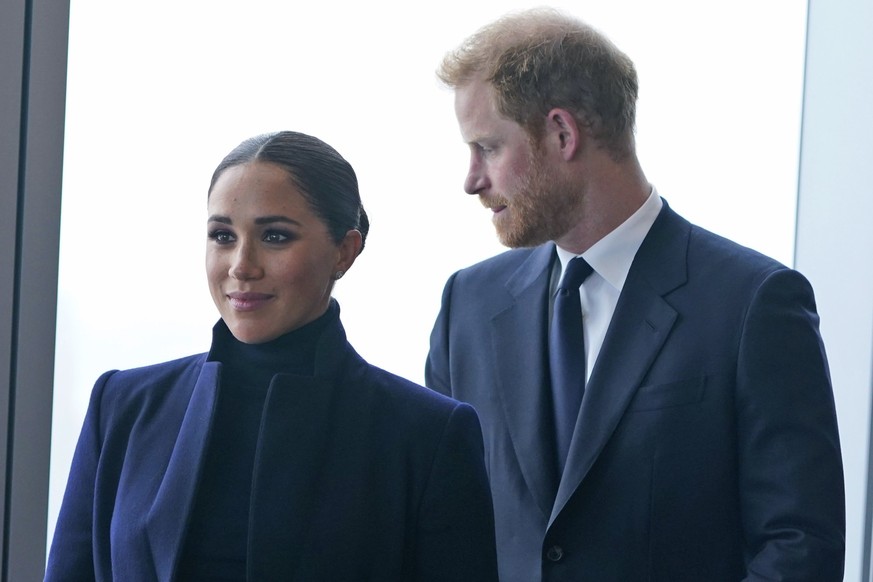 FILE - Meghan Markle, and her husband Prince Harry arrive to the observatory in One World Trade in New York, Thursday, Sept. 23, 2021. After months of speculation about whether they would be invited t ...