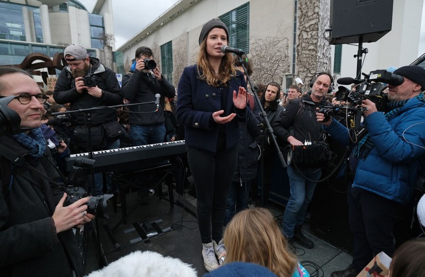 BERLIN, GERMANY - MARCH 15: Climate activist Luisa Neubauer speaks at a FridaysForFuture climate protest march outside the Chancellery on March 15, 2019 in Berlin, Germany. According to organizers str ...