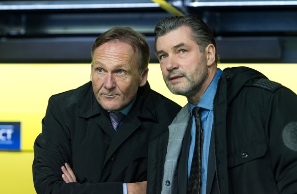 Aki Watzke (l.) und Michael Zorc müssen sich Kritik gefallen lassen