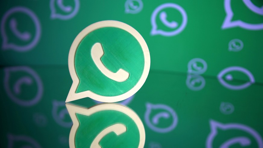 FILE PHOTO: A 3D printed Whatsapp logo is seen in front of a displayed Whatsapp logo in this illustration September 14, 2017. REUTERS/Dado Ruvic/File Photo