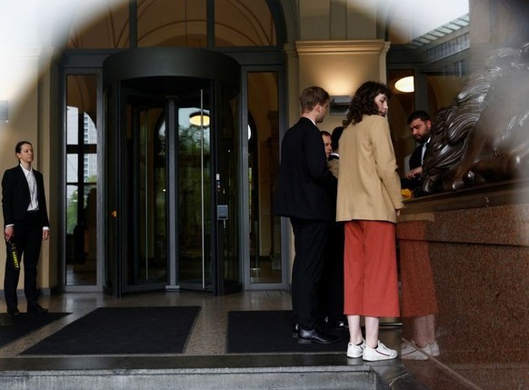 Activists of the &quot;Letzte Generation&quot; (Last Generation) arrive for a meeting with German Transport Minister Volker Wissing (not pictured) at the ministry, in Berlin, Germany, May 2, 2023. REU ...