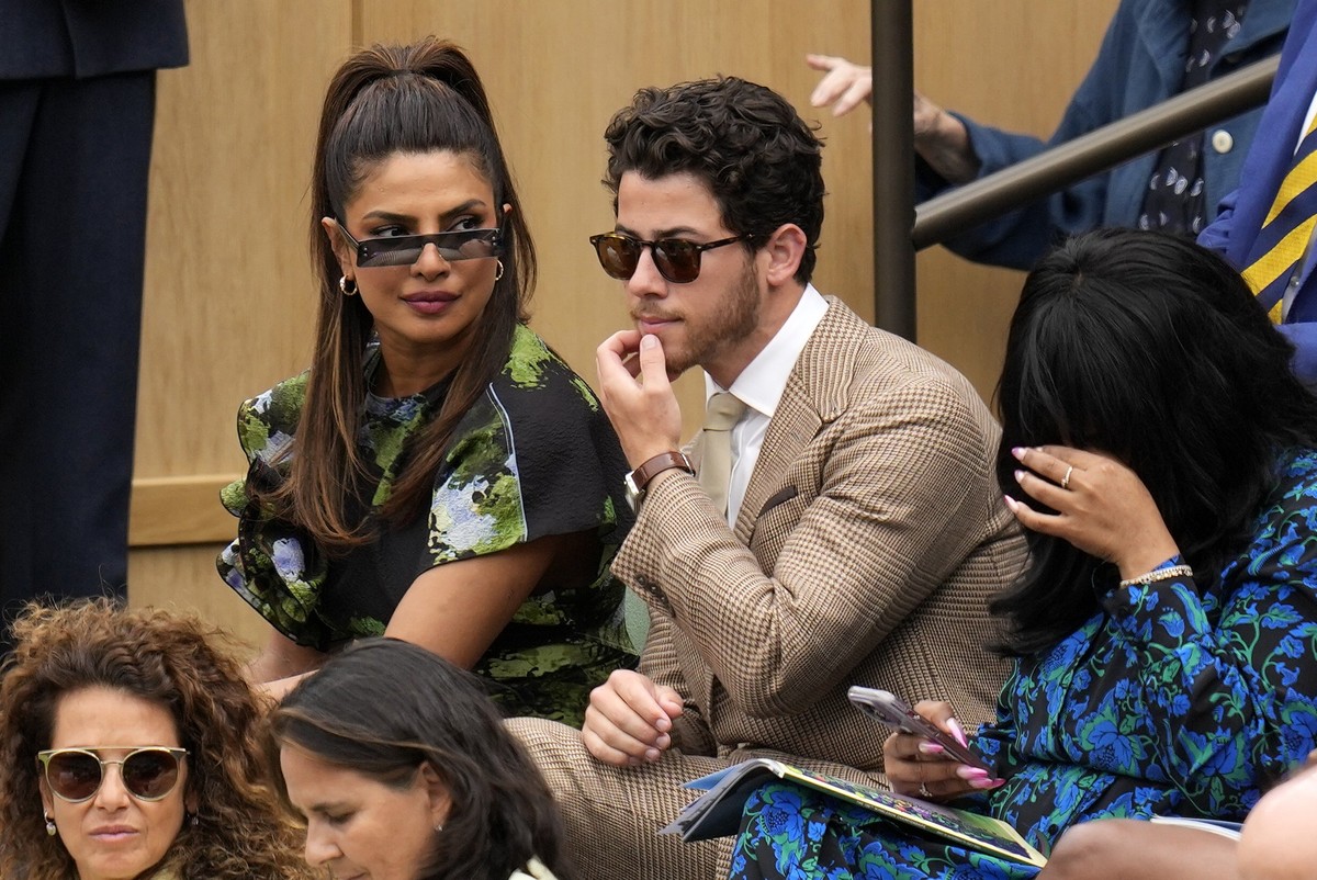 Priyanka Chopra Jonas and her husband Nick Jonas sit in the Royal Box ahead of the final of the women&#039;s singles between the Czech Republic&#039;s Marketa Vondrousova and Tunisia&#039;s Ons Jabeur ...