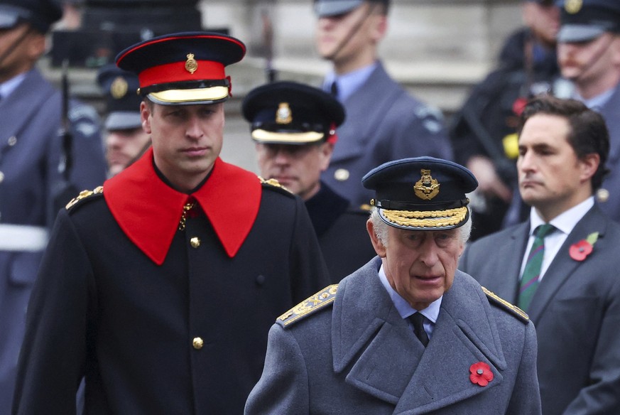 FILE - Britain&#039;s King Charles III, right, and Prince William attend the annual Remembrance Sunday ceremony at the Cenotaph in London, Sunday, Nov. 12, 2023. King Charles III has been diagnosed wi ...