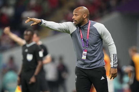 Belgium assistant coach Thierry Henry gives instructions during the World Cup group F soccer match between Belgium and Canada, at the Ahmad Bin Ali Stadium in Doha, Qatar, Wednesday, Nov. 23, 2022. (A ...