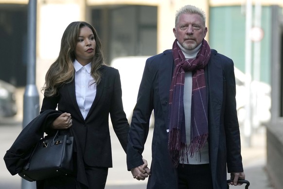 ARCHIV - 22.03.2022, Gro�britannien, London: Boris Becker (r) und seine Freundin Lilian de Carvalho Monteiro treffen vor dem Southwark Crown Court ein. (zu dpa �Becker: Im Gef�ngnis nie an Beziehung z ...