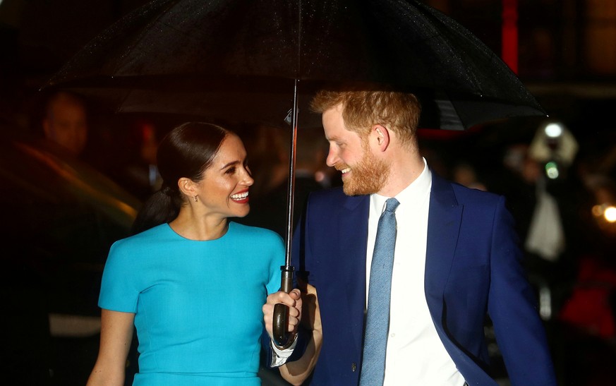 FILE PHOTO: Britain&#039;s Prince Harry and his wife Meghan, Duchess of Sussex, arrive at the Endeavour Fund Awards in London, Britain March 5, 2020. REUTERS/Hannah McKay/File Photo