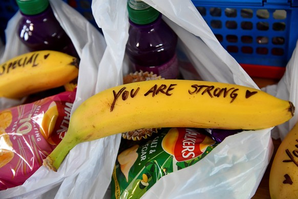 . 01/02/2019. Bristol, United Kingdom. A handwritten message is seen on a banana in a food parcel prepared by Meghan, Duchess of Sussex to go in the charity outreach van, during a visit to the charity ...