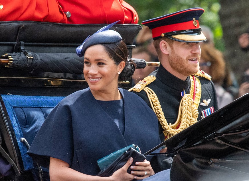 Trooping the Colour Meghan, Duchess of Sussex rides in an open carriage with Prince Harry, Duke of Sussex during Trooping the Colour in London on June 08, 2019. This was her first public engagement si ...
