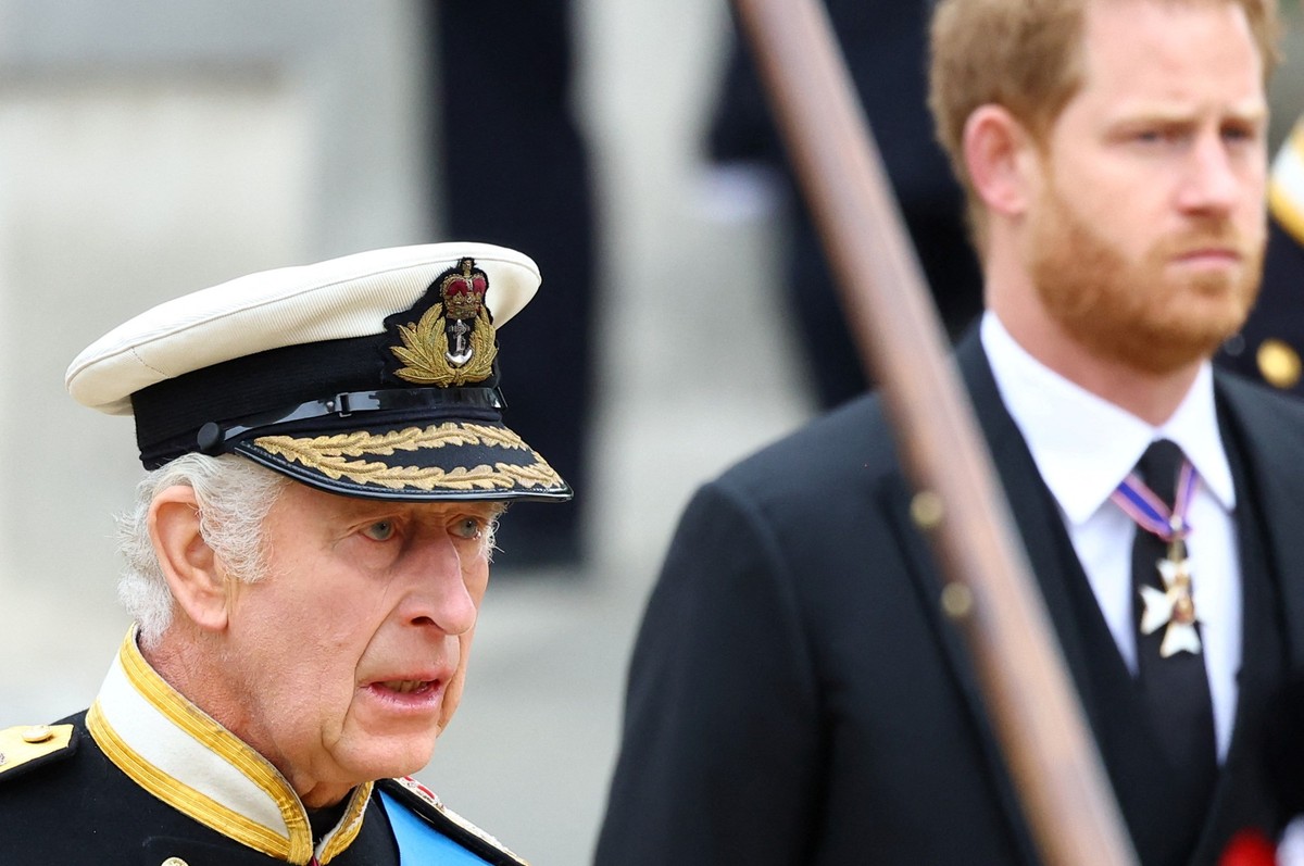 LONDON, ENGLAND - SEPTEMBER 19: King Charles III and Prince Harry, Duke of Sussex follow the coffin of Queen Elizabeth II as it is carried into Westminster Abbey on September 19, 2022 in London, Engla ...