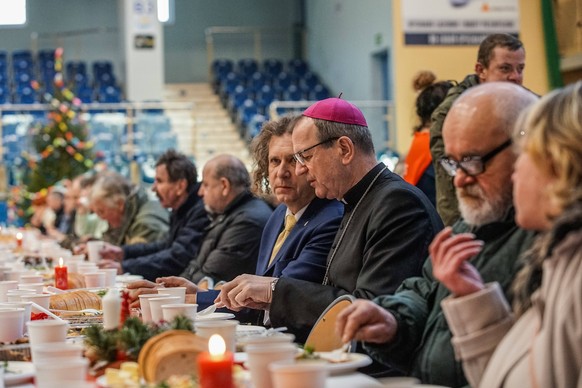 Christmas Eve Meal For Poor And Homeless In Sopot, Poland Archbishop Tadeusz Wojda R and Mayor of Sopot Jacek Karnowski are seen. is seen. Over 300 people who took part in the Christmas Eve meal in So ...