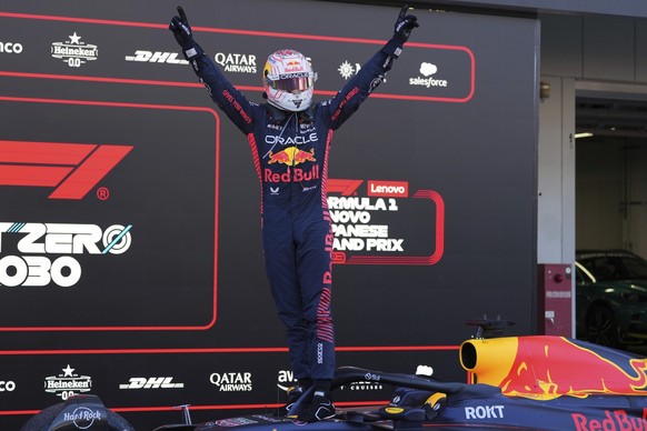 Red Bull driver Max Verstappen of the Netherlands celebrates after winning the Japanese Formula One Grand Prix at the Suzuka Circuit, Suzuka, central Japan, Sunday, Sept. 24, 2023. (AP Photo/Toru Hana ...