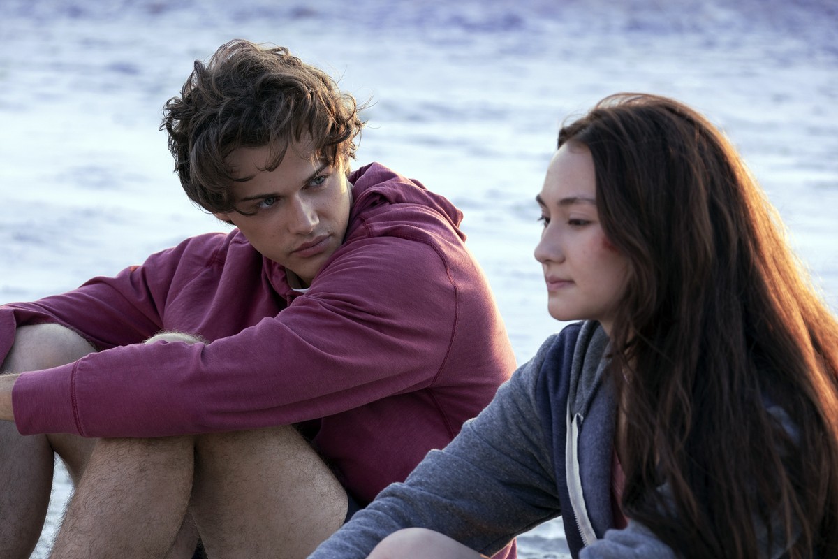 This image released by Amazon Prime Video shows Christopher Briney, left, and Lola Tung in a scene from the series &quot;The Summer I Turned Pretty.&quot; (Dana Hawley/Amazon Prime Video via AP)
