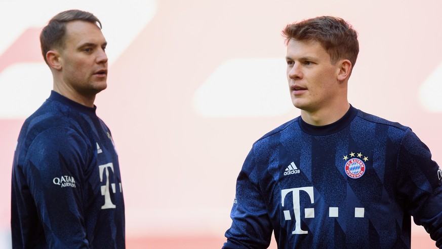 MUNICH, GERMANY - APRIL 10: Goalkeeper Manuel Neuer of FC Bayern München and Goalkeeper Alexander Nübel of FC Bayern München seen ahaed of the Bundesliga match between FC Bayern Muenchen and 1. FC Uni ...