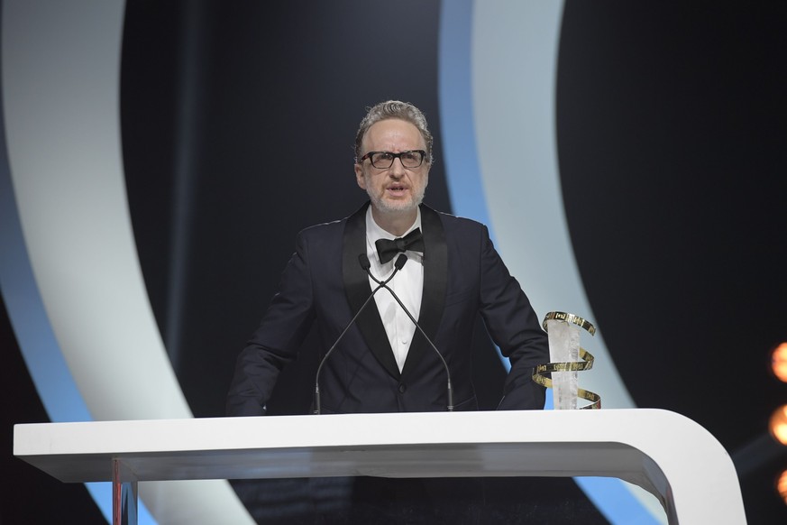 American director James Gray speaks after receiving a career tribute trophy from during the 19th Marrakech International Film Festival in Marrakech, Morocco, Saturday, Nov. 12, 2022. (AP Photo)