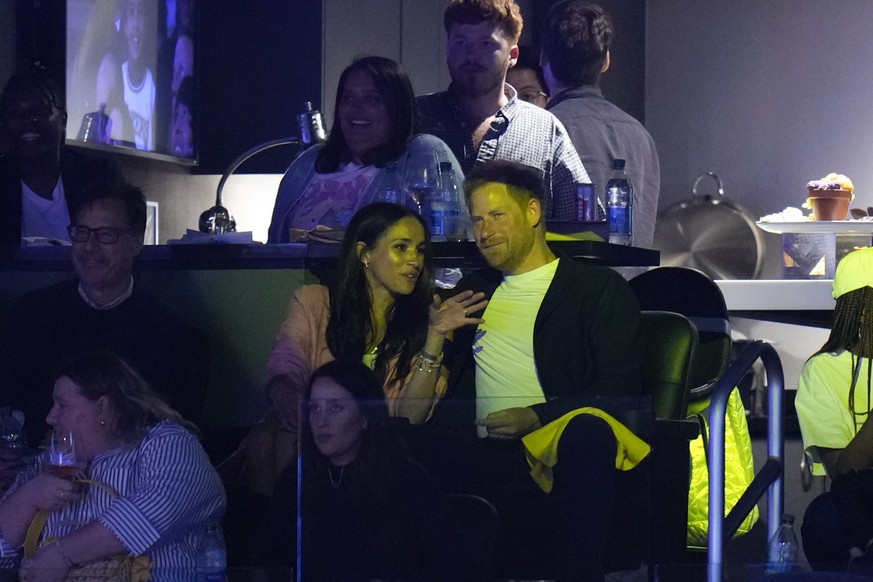 Prince Harry and Meghan Markle attend the Los Angeles Lakers&#039; Game 4 of a first-round NBA basketball playoff series against the Memphis Grizzlies Monday, April 24, 2023, in Los Angeles. (AP Photo ...