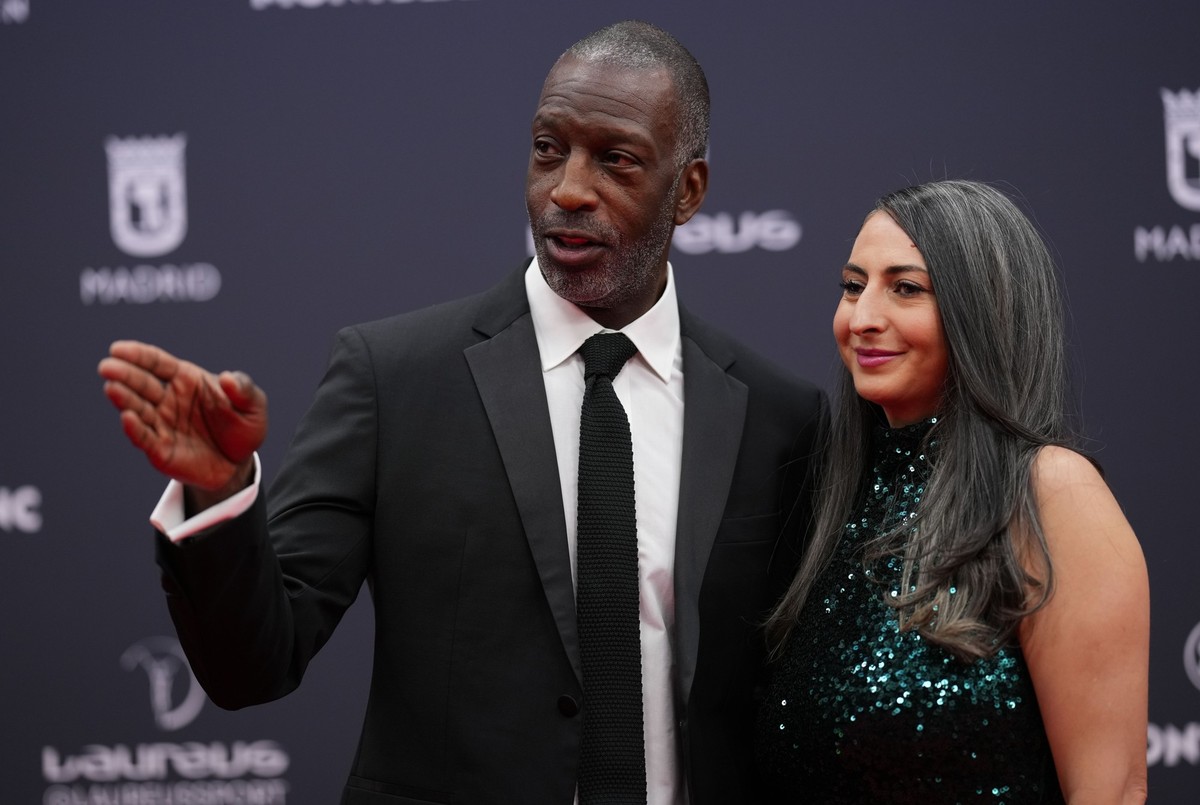 FILE - Former U.S. athlete Michael Johnson, left, and wife Armine Shamiryan arrive at the Laureus Sports Awards ceremony in Madrid, Monday, April 22, 2024. Sprinting great Michael Johnson is launching ...