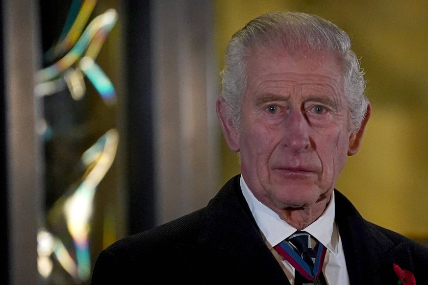 . 11/11/2023. London, United Kingdom. King Charles III reacts after unveiling statues of Queen Elizabeth II and Prince Phillip at the Royal British Legion Festival of Remembrance in London. PUBLICATIO ...