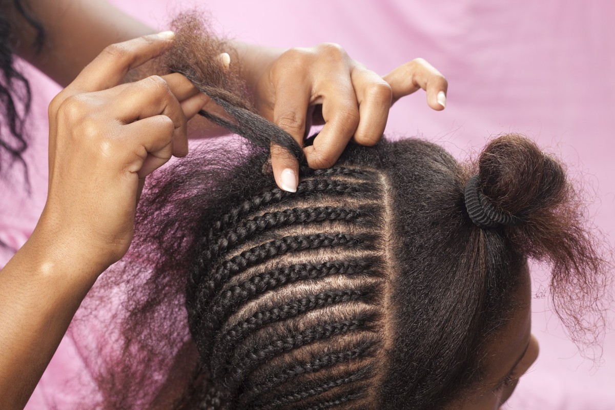 Updo African hairstyle with hair extension.Similar images preview:
