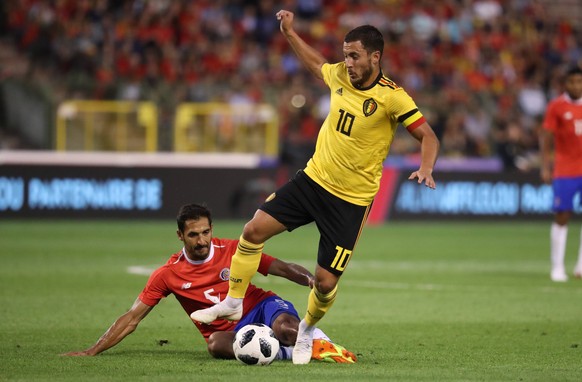 Costa Rica s Celso Borges and Belgium s Eden Hazard fight for the ball during a friendly soccer game between Belgian national team Nationalteam The Red Devils and Costa Rica, Monday 11 June 2018, in B ...
