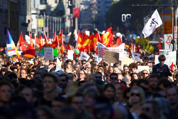 Protesters gather to the &quot;#unteilbar&quot;, demonstration which aims to &quot;rise up against discrimination, poverty, racism, sexism, disenfranchisement, and nationalism&quot; in Berlin, Germany ...