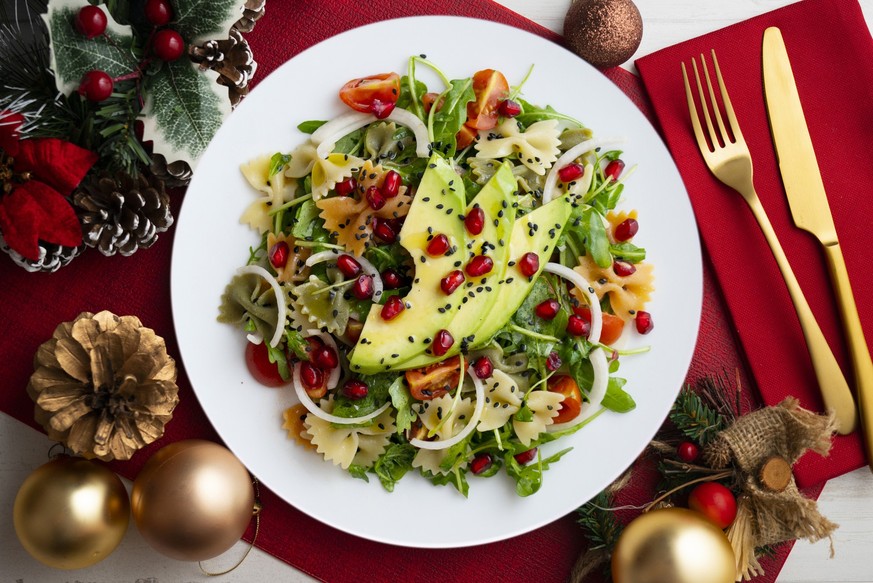 Christmas food served on a table decorated with Christmas motifs.