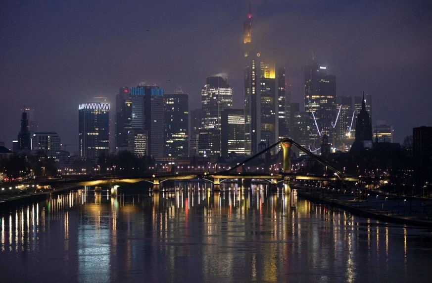 The skyline of the high-rise buildings of the banking district of Frankfurt am Main, western Germany, is pictured on early morning of February 03, 2022. (Photo by ANDRE PAIN / AFP) (Photo by ANDRE PAI ...