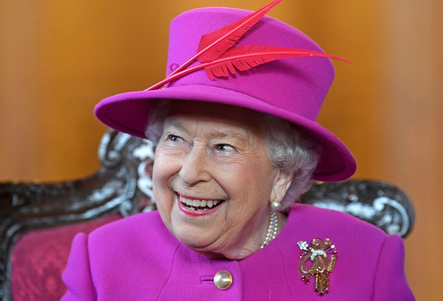 FILE PHOTO: Britain's Queen Elizabeth visits The Honourable Society of Lincoln's Inn to open the new Ashworth Centre, and re-open the recently renovated Great Hall, in London, Britain, December 13, 20 ...