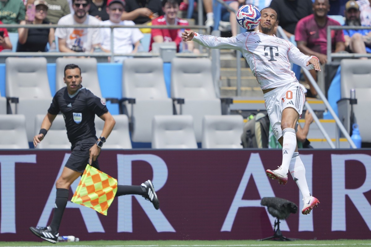 Bayern Munich's Leroy Sane goes after the ball during the Club World Cup Group C soccer match between Benfica and Bayern Munich in Charlotte, N.C., Tuesday, June 24, 2025. (AP Photo/Chris Carlson ...