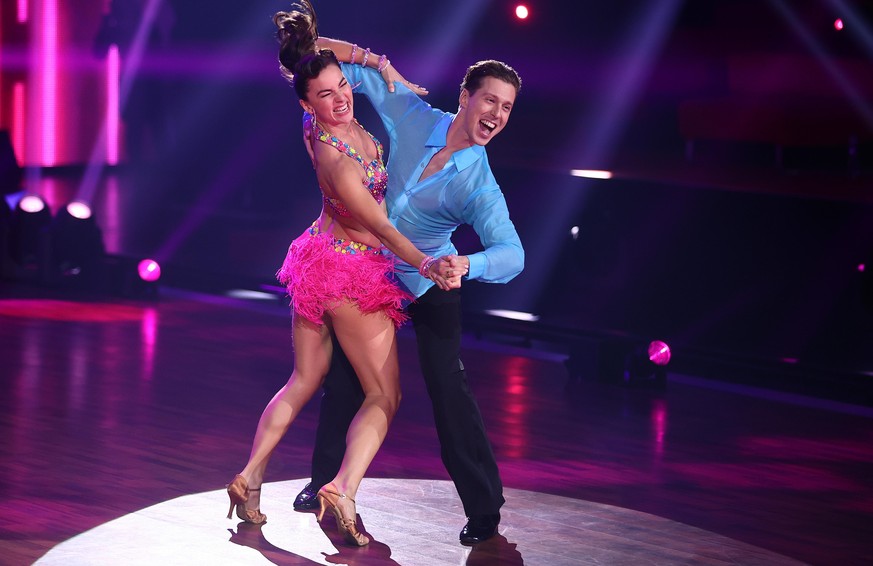 COLOGNE, GERMANY - MARCH 19: Renata Lusin and Valentin Lusin perform on stage during the 3rd show of the 14th season of the television competition &quot;Let&#039;s Dance&quot; on March 19, 2021 in Col ...