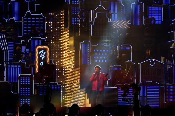 The Weeknd performs during halftime of the NFL Super Bowl 55 football game between during the halftime show of the NFL Super Bowl 55 football game between the Kansas City Chiefs and Tampa Bay Buccanee ...