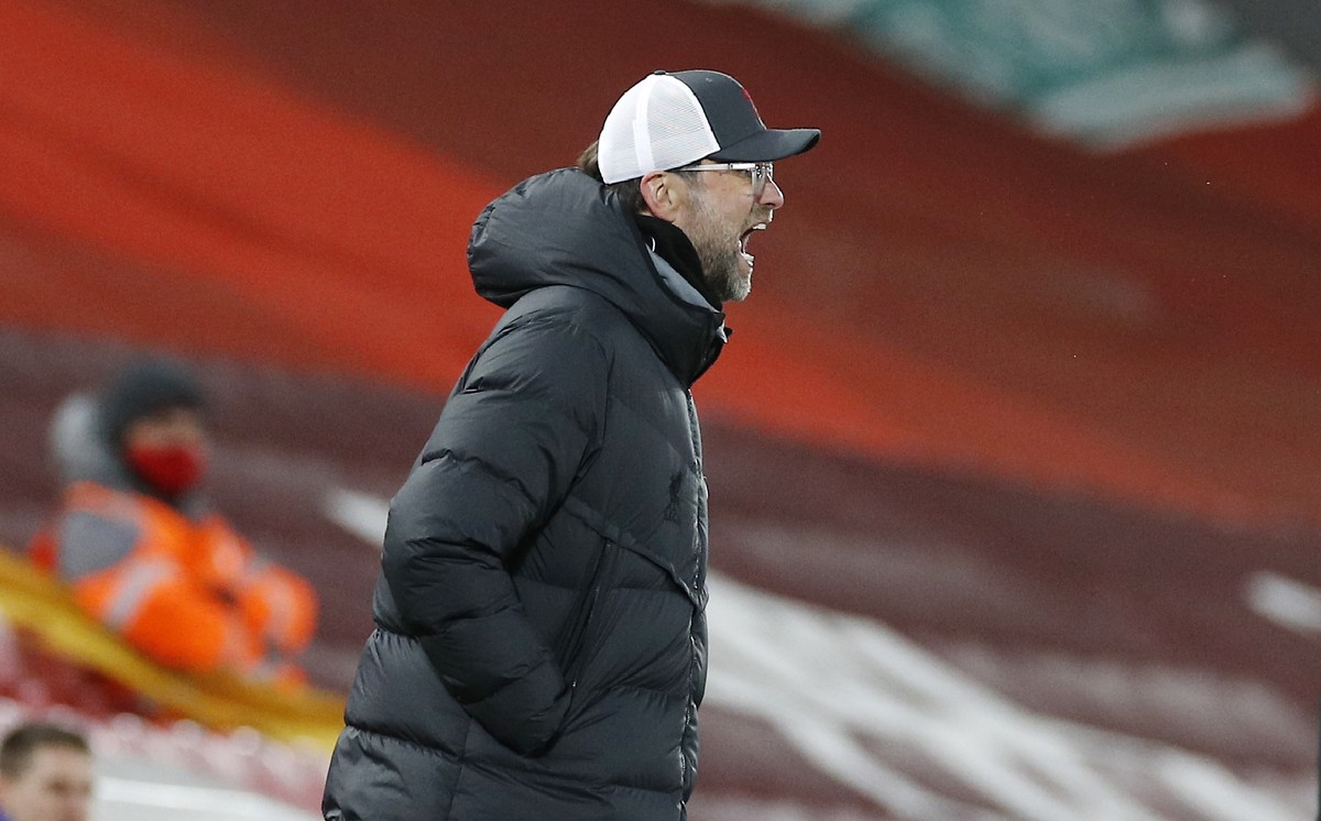 Liverpool's manager Jurgen Klopp gives instructions during the English Premier League soccer match between Liverpool and Chelsea at Anfield stadium in Liverpool, England, Thursday, March 4, 2021. ...