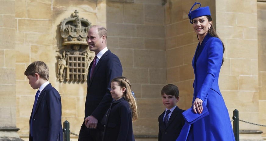 Britain&#039;s Prince William and Kate, Princess of Wales with their children Prince George, left, Princess Charlotte and Prince Louis attend the Easter Mattins Service at St George&#039;s Chapel at W ...