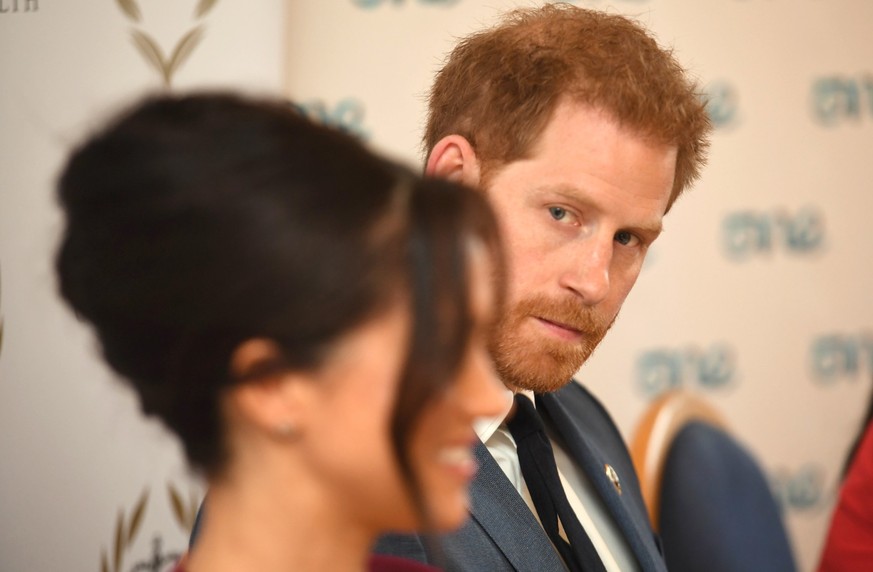 WINDSOR, UNITED KINGDOM - OCTOBER 25: Meghan, Duchess of Sussex and Prince Harry, Duke of Sussex attend a roundtable discussion on gender equality with The Queens Commonwealth Trust (QCT) and One Youn ...