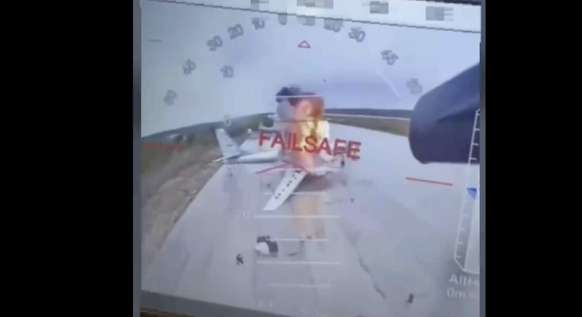 In this image taken from video released June 1, 2025, by a source in the Ukrainian Security Service shows a Ukrainian drone striking Russian planes deep in Russia's territory. (Source in the Ukra ...