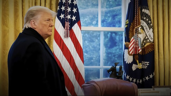 This exhibit from video released by the House Select Committee, shows a photo of then-President Donald Trump with his coast on as he returns to the Oval Office after speaking on the Ellipse on Jan. 6, ...