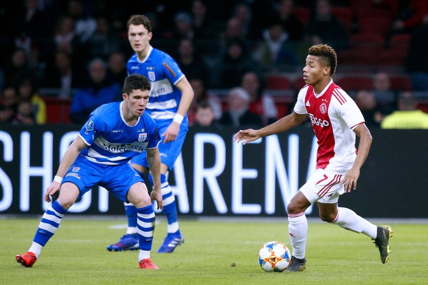 AMSTERDAM, Ajax - PEC Zwolle, 13-03-2019 football, Dutch Eredivisie Season 2018 - 2019, Stadium de Arena, Ajax player David Neres (R) and PEC Zwolle player Pelle Clement (L) during the game Ajax - PEC ...