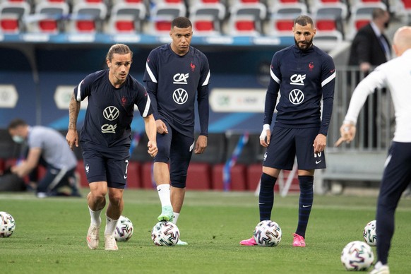 Karim Benzema, Antoine Griezmann and Kylian MBappe of France during a training session before the International Friendly match between France and Wales at Allianz Riviera Stadium on June 2, 2021 in Ni ...