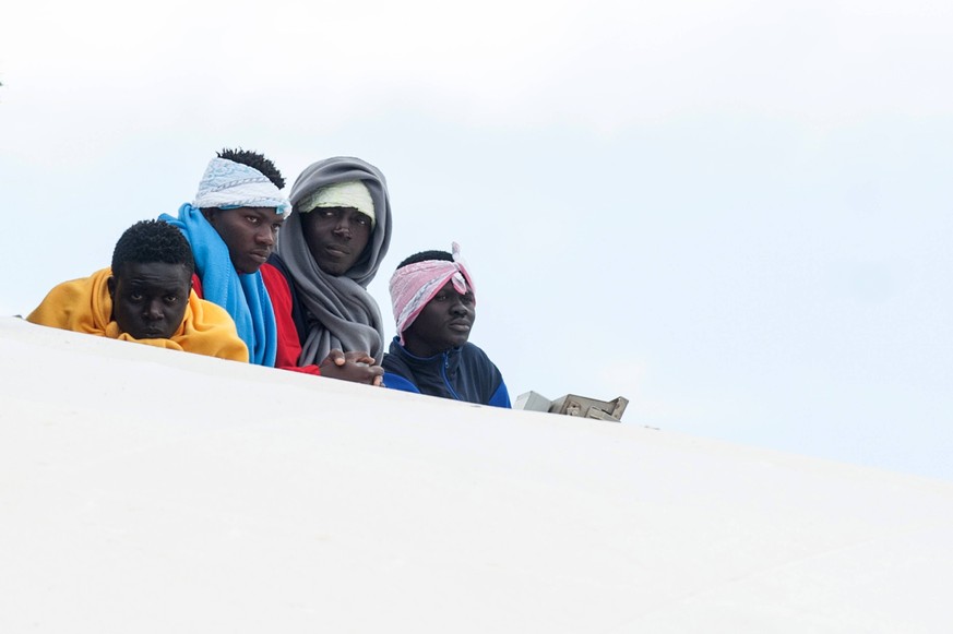 Italy: Migrants disembark during the G7 Migrants disembark from the Aquarius ship of the NGO SOS Mediterranee - Doctors without borders, coming from Libya, Nigeria, Mali, Morocco, Pakistan, Bangladesh ...