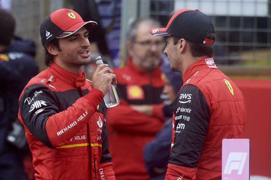 Carlos Sainz of Spain and Charles Leclerc of Monaco and Scuderia Ferrari after the qualifying ahead of the F1 Grand Prix of Great Britain at Silverstone on July 2, 2022 in Northampton, United Kingdom