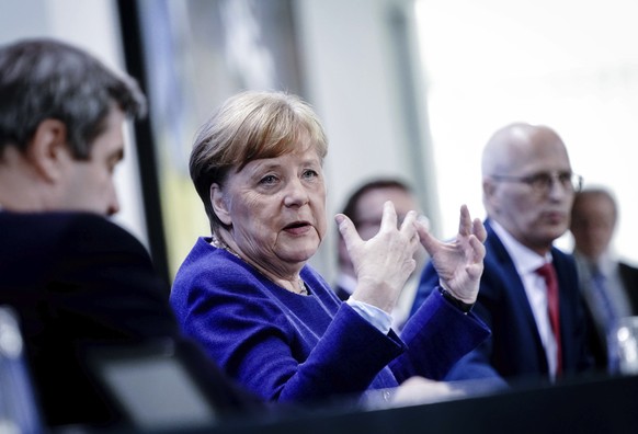 Germany Chancellor Angela Merkel speaks during a press conference after the video conference with the prime ministers of the German states, in Berlin, Thursday April 30, 2020. (Kay Nietfeld/pool via A ...