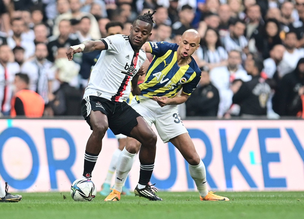 Michy Batshuayi L of Besiktas and Marcel Tisserand of Fenerbahce during the Turkish Super League football match between Besiktas and Fenerbahce at Vodafone Park Stadium in Istanbul , Turkey on May 08 ...